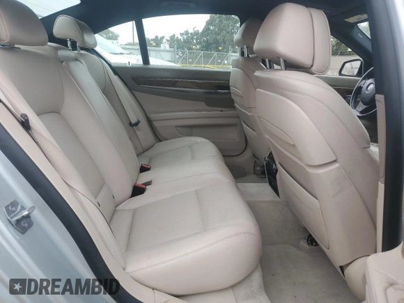 2013 BMW 7 Series 740i with VIN WBAYA6C53DD143952, listed as a Copart auction lot 76064454 with 119,896 mi miles and Clean Title. Bid and sale history available at carsss.com. Image 10.