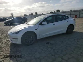 2022 Tesla Model 3 with VIN 5YJ3E1EA2NF290515, listed as a Copart auction lot 54273305 with 131,928 mi miles and Clean Title. Bid and sale history available at DreamBid. Image 1.