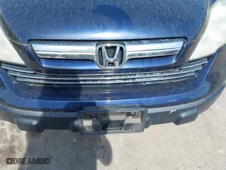 2007 Honda CR-V EX-L with VIN 5J6RE48757L017641, listed as a IAAI auction lot 42039082 with 213,859 mi miles. Bid and sale history available at carsss.com. Image 6.