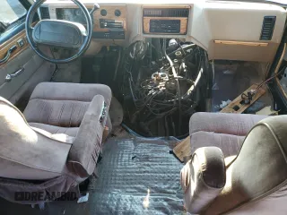 1995 GMC Vandura z VIN 1GDEG25K2SF543904, wystawiony jako Copart lot #68934904 z przebiegiem 949 271 mil mil oraz Szkody całkowita. Historia ofert i sprzedaży dostępna na DreamBid. Obrazek 8.