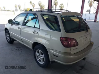 1999 Lexus RX 300 Luxury SUV with VIN JT6HF10UXX0020400, listed as a IAAI auction lot 41866556 with 237,899 mi miles. Bid and sale history available at carsss.com. Image 3.