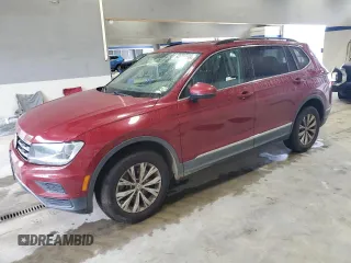 2018 Volkswagen Tiguan SEL with VIN 3VV3B7AX0JM124135, listed as a Copart auction lot 60721155 with 98,247 mi miles and Salvage title. Bid and sale history available at DreamBid. Image 1.