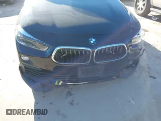 2019 BMW X2 sDrive28i with VIN WBXYJ3C50KEP77327, listed as a IAAI auction lot 40922194 with 94,672 mi miles. Bid and sale history available at carsss.com. Image 20.