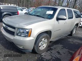 2007 Chevrolet Suburban LS with VIN 1GNFC16047J252702, listed as a IAAI auction lot 41576927 with 401,122 mi miles and . Bid and sale history available at DreamBid. Image 2.