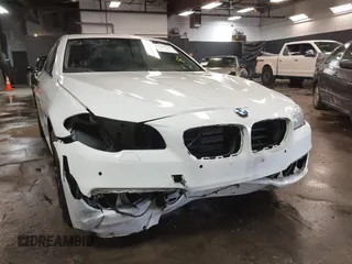 2014 BMW 5 Series 528i xDrive with VIN WBA5A7C57ED612230, listed as a IAAI auction lot 41586318 with 148,676 mi miles and . Bid and sale history available at DreamBid. Image 6.