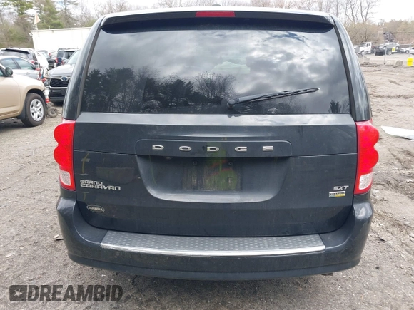 2019 Dodge Grand Caravan SXT with VIN 2C4RDGCG9KR804867, listed as a IAAI auction lot 42032311 with 157,351 mi miles and . Bid and sale history available at DreamBid. Image 16.