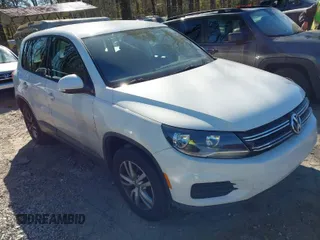 2012 Volkswagen Tiguan SE with VIN WVGAV7AX9CW590965, listed as a IAAI auction lot 41852407 with 153,953 mi miles and . Bid and sale history available at DreamBid. Image 1.