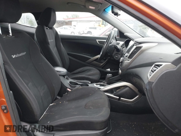 2012 Hyundai Veloster w/Gray Int with VIN KMHTC6AD3CU057620, listed as a IAAI auction lot 42320549 with 113,491 mi miles and . Bid and sale history available at DreamBid. Image 5.