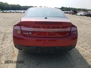 2015 Lincoln MKZ z VIN 3LN6L2GK2FR603783, wystawiony jako Copart lot #60038835 z przebiegiem 66 820 mil mil oraz Szkoda całkowita • Salvage title. Historia ofert i sprzedaży dostępna na DreamBid. Obrazek 6.