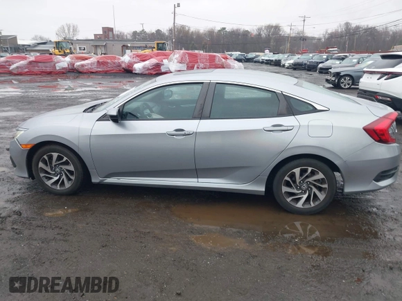 2016 Honda Civic EX with VIN 19XFC2F75GE217935, listed as a IAAI auction lot 41963307 with 87,477 mi miles and . Bid and sale history available at DreamBid. Image 14.