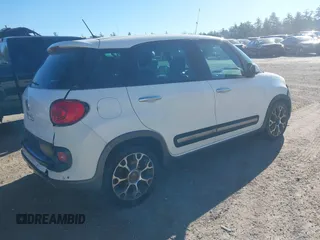 2014 FIAT 500L Trekking with VIN ZFBCFADH4EZ008478, listed as a IAAI auction lot 40806755 with 139,166 mi miles and . Bid and sale history available at DreamBid. Image 4.