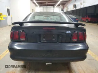 1997 Ford Mustang GT with VIN 1FALP42X4VF192088, listed as a Copart auction lot 84714114 with 194,845 mi miles and Salvage title. Bid and sale history available at DreamBid. Image 6.