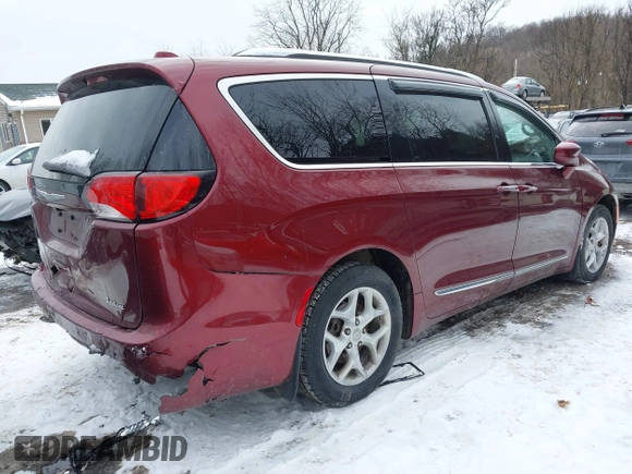 2017 Chrysler Pacifica Touring L Plus with VIN 2C4RC1EG6HR652908, listed as a IAAI auction lot 41381104 with 82,186 mi miles and . Bid and sale history available at DreamBid. Image 4.