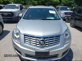 2015 Cadillac SRX Luxury Collection z VIN 3GYFNBE35FS627640, wystawiony jako IAAI lot #42262843 z przebiegiem 211 669 mil mil oraz . Historia ofert i sprzedaży dostępna na DreamBid. Obrazek 6.