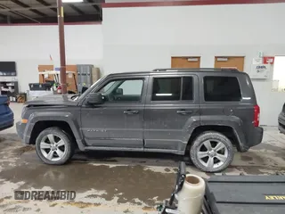 2016 Jeep Patriot High Altitude Edition with VIN 1C4NJRFB0GD632774, listed as a IAAI auction lot 41149683 with 96,495 mi miles. Bid and sale history available at carsss.com. Image 14.