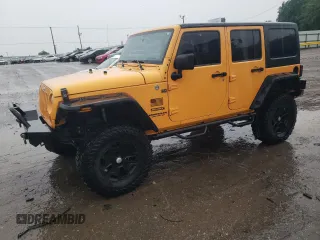 2012 Jeep Wrangler Unlimited Sport z VIN 1C4BJWDG5CL276922, wystawiony jako Copart lot #55561575 z przebiegiem 130 017 mil mil oraz Szkoda całkowita • Salvage title. Historia ofert i sprzedaży dostępna na DreamBid. Obrazek 1.