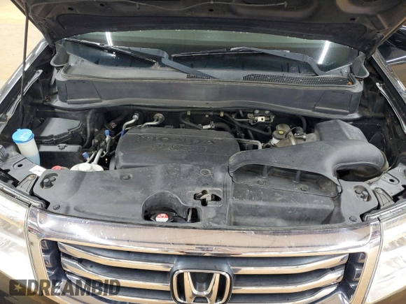 2014 Honda Pilot EX-L with VIN 5FNYF4H75EB011062, listed as a Copart auction lot 57830935 with 128,847 mi miles and Salvage title. Bid and sale history available at DreamBid. Image 12.