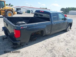 2017 Chevrolet Silverado 1500 LT with VIN 1GCVKREC9HZ180710, listed as a IAAI auction lot 40204758 with 255,247 mi miles and . Bid and sale history available at DreamBid. Image 4.