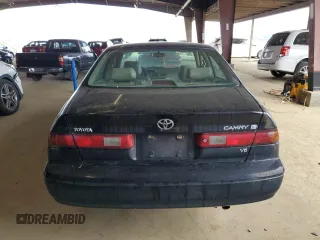 1998 Toyota Camry LE z VIN JT2BF28KXW0141801, wystawiony jako Copart lot #48014915 z przebiegiem 189 656 mil mil oraz Czysty tytuł • Clean title. Historia ofert i sprzedaży dostępna na DreamBid. Obrazek 6.