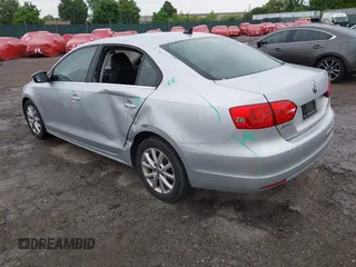 2013 Volkswagen Jetta SE with VIN 3VWDP7AJ0DM363220, listed as a IAAI auction lot 42245043 with 165,498 mi miles and . Bid and sale history available at DreamBid. Image 3.