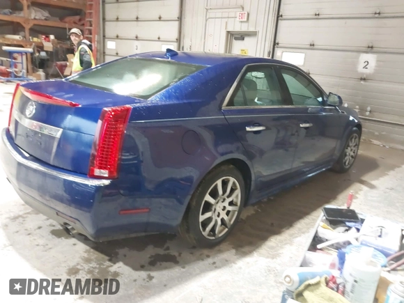 2012 Cadillac CTS Luxury z VIN 1G6DG5E5XC0125819, wystawiony jako IAAI lot #42251305 z przebiegiem 233 887 mil mil oraz . Historia ofert i sprzedaży dostępna na DreamBid. Obrazek 4.