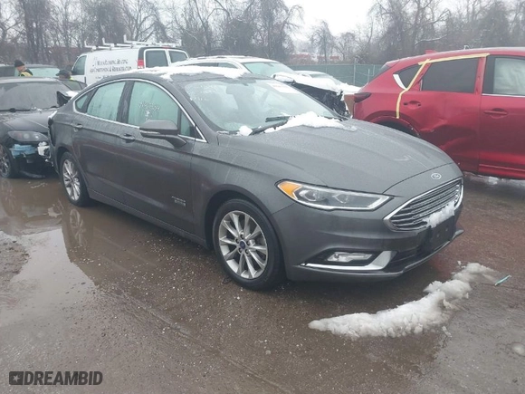 2017 Ford Fusion Energi SE with VIN 3FA6P0PU6HR203037, listed as a IAAI auction lot 41567334 with 96,852 mi miles. Bid and sale history available at carsss.com. Image 1.