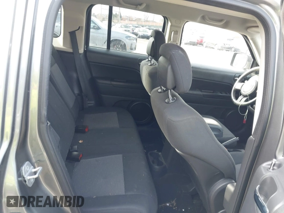 2012 Jeep Patriot Latitude with VIN 1C4NJRFB3CD599831, listed as a IAAI auction lot 41627914 with 135,534 mi miles and . Bid and sale history available at carsss.com. Image 8.