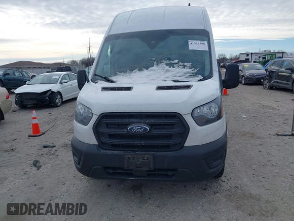 2020 Ford Transit Cargo with VIN 1FTBR3X85LKB51985, listed as a IAAI auction lot 41327206 with 206,896 mi miles and . Bid and sale history available at carsss.com. Image 12.