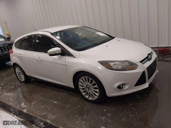 2012 Ford Focus Titanium with VIN 1FAHP3N26CL122364, listed as a IAAI auction lot 41777664 with NaN miles. Bid and sale history available at carsss.com. Image 1.