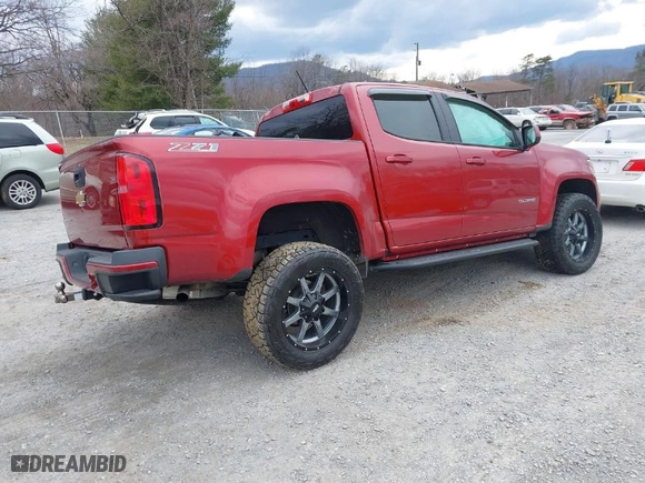 2015 Chevrolet Colorado 4WD Z71 with VIN 1GCGTCE3XF1134799, listed as a IAAI auction lot 41654026 with 104,830 mi miles. Bid and sale history available at carsss.com. Image 4.