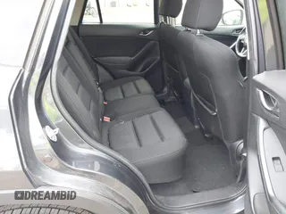 2014 Mazda CX-5 Touring with VIN JM3KE2CYXE0332517, listed as a IAAI auction lot 42109592 with 138,214 mi miles. Bid and sale history available at carsss.com. Image 8.