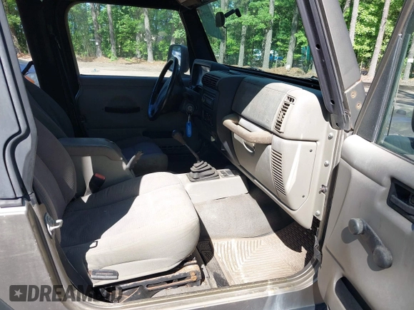 2003 Jeep Wrangler Sport with VIN 1J4FA49S13P313180, listed as a IAAI auction lot 42349673 with 141,073 mi miles and . Bid and sale history available at DreamBid. Image 5.