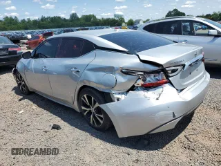 2017 Nissan Maxima Platinum with VIN 1N4AA6APXHC444065, listed as a Copart auction lot 58602495 with 93,446 mi miles and Salvage title. Bid and sale history available at DreamBid. Image 2.