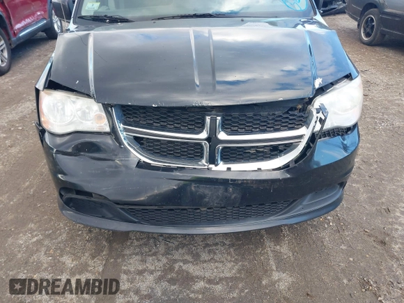 2014 Dodge Grand Caravan SXT with VIN 2C4RDGCG4ER337202, listed as a IAAI auction lot 40781755 with 258,524 mi miles and . Bid and sale history available at DreamBid. Image 12.