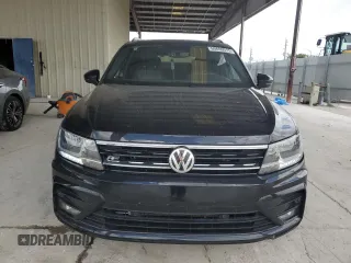2021 Volkswagen Tiguan SE with VIN 3VV3B7AX4MM095257, listed as a Copart auction lot 60690015 with 61,782 mi miles and Salvage title. Bid and sale history available at DreamBid. Image 5.