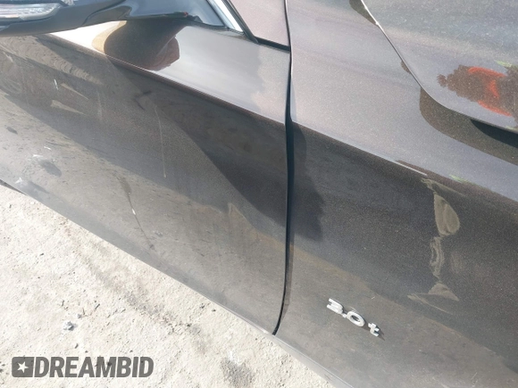 2019 Infiniti Q50 3.0t LUXE with VIN JN1EV7AP9KM512446, listed as a IAAI auction lot 41311730 with 105,000 mi miles. Bid and sale history available at carsss.com. Image 5.