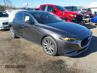 2021 Mazda 3 Select with VIN JM1BPBBL0M1329224, listed as a IAAI auction lot 41348699 with 12,338 mi miles. Bid and sale history available at carsss.com. Image 1.