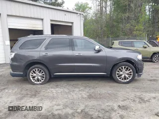 2014 Dodge Durango Citadel with VIN 1C4RDJEG1EC530474, listed as a IAAI auction lot 41961801 with 165,625 mi miles and . Bid and sale history available at DreamBid. Image 13.