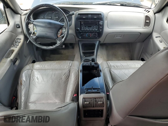 1998 Ford Explorer XLT z VIN 1FMZU32E6WUD38246, wystawiony jako Copart lot #66407954 z przebiegiem 103 018 mil mil oraz Szkoda całkowita • Salvage title. Historia ofert i sprzedaży dostępna na DreamBid. Obrazek 8.