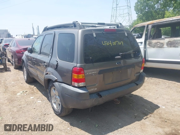 2002 Ford Escape XLT Choice with VIN 1FMYU041X2KB88832, listed as a IAAI auction lot 42400767 with 194,124 mi miles and . Bid and sale history available at DreamBid. Image 3.