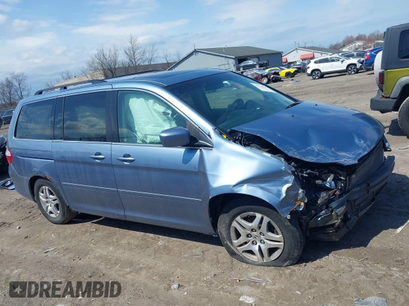 2007 Honda Odyssey EX-L with VIN 5FNRL38727B092077, listed as a IAAI auction lot 41972810 with 211,770 mi miles and . Bid and sale history available at DreamBid. Image 14.