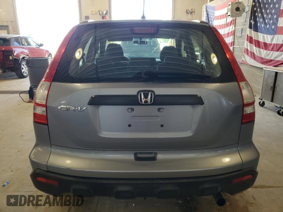 2007 Honda CR-V LX z VIN JHLRE383X7C040333, wystawiony jako Copart lot #57895475 z przebiegiem 124 156 mil mil oraz Szkoda całkowita • Salvage title. Historia ofert i sprzedaży dostępna na DreamBid. Obrazek 6.