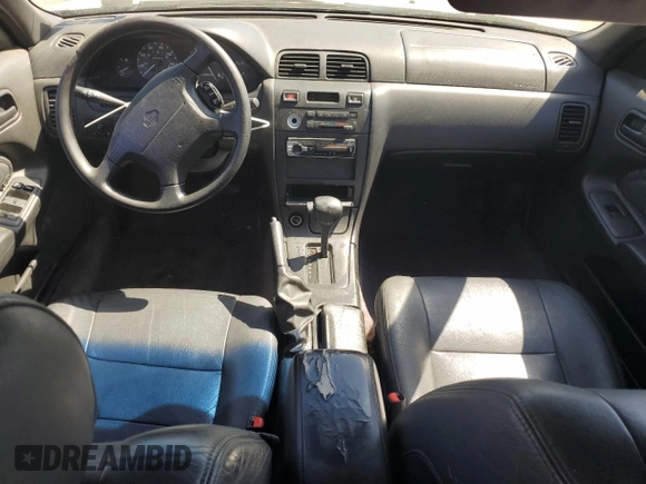 1997 Nissan Maxima GXE z VIN JN1CA21DXVT877062, wystawiony jako Copart lot #49411185 z przebiegiem 249 941 mil mil oraz Szkoda całkowita • Salvage title. Historia ofert i sprzedaży dostępna na DreamBid. Obrazek 8.