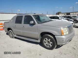 2004 Cadillac Escalade EXT z VIN 3GYEK62N04G272832, wystawiony jako Copart lot #77624314 z przebiegiem 250 404 mil mil oraz Czysty tytuł • Clean title. Historia ofert i sprzedaży dostępna na DreamBid. Obrazek 4.