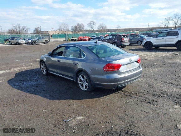 2013 Volkswagen Passat SEL Premium with VIN 1VWCM7A32DC063184, listed as a IAAI auction lot 41505096 with 121,482 mi miles. Bid and sale history available at carsss.com. Image 3.