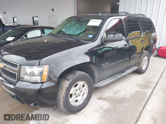2013 Chevrolet Tahoe LS with VIN 1GNSCAE04DR287477, listed as a IAAI auction lot 41878790 with Not provided miles and . Bid and sale history available at DreamBid. Image 2.