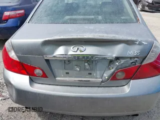 2006 Infiniti M with VIN JNKAY01E96M116823, listed as a IAAI auction lot 42028550 with 256,590 mi miles. Bid and sale history available at carsss.com. Image 6.
