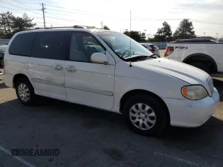 2005 Kia Sedona LX with VIN KNDUP132056685525, listed as a Copart auction lot 77790354 with 60,985 mi miles and Salvage Title. Bid and sale history available at carsss.com. Image 4.