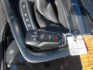 2016 Ford Fusion Titanium Hybrid with VIN 3FA6P0RU8GR127140, listed as a IAAI auction lot 41750405 with 110,861 mi miles. Bid and sale history available at carsss.com. Image 11.