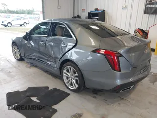 2021 Cadillac CT4 Luxury with VIN 1G6DA5RK4M0147723, listed as a IAAI auction lot 41646082 with 14,459 mi miles and . Bid and sale history available at DreamBid. Image 3.